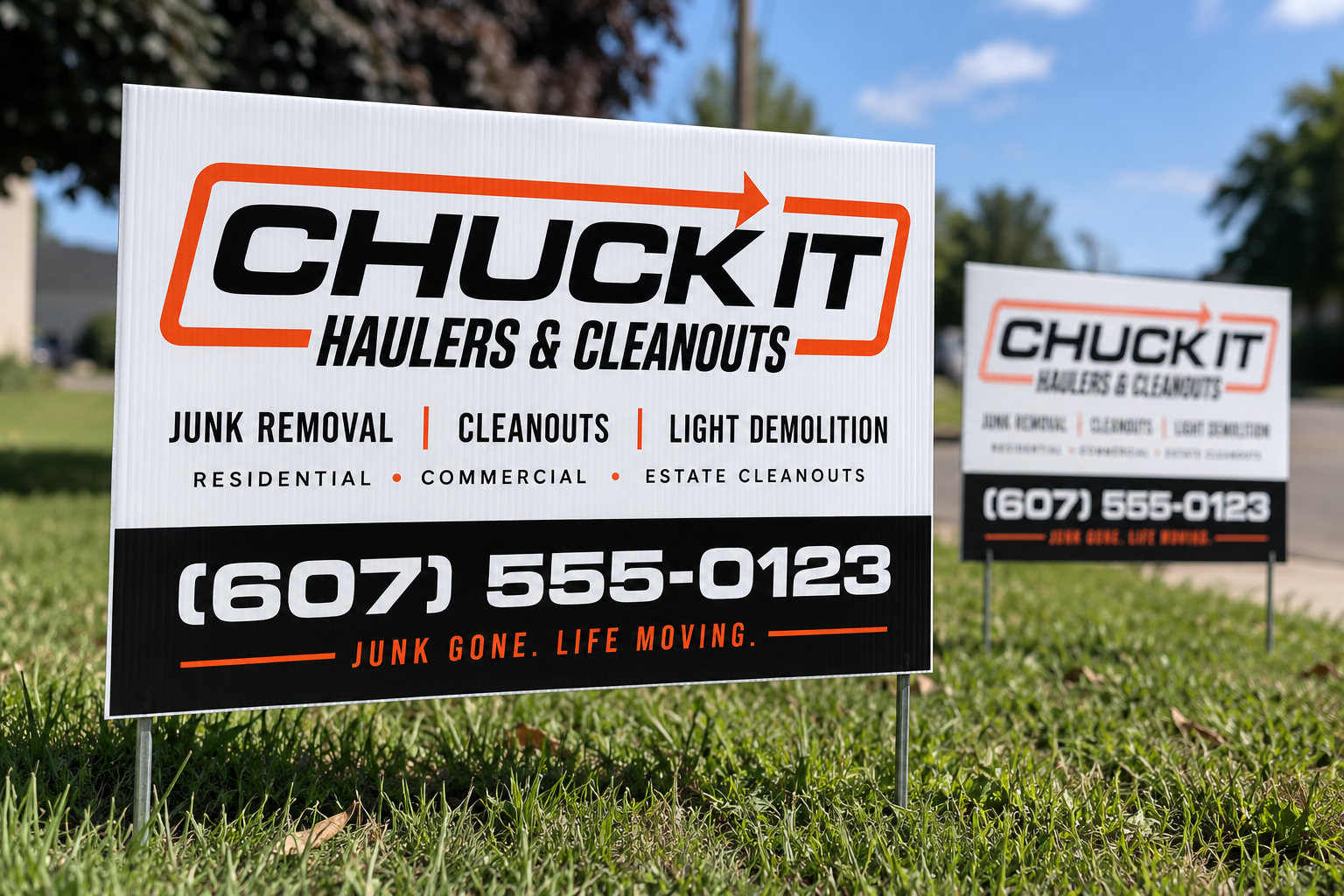 Chuck-It-Haulers branded yard signs